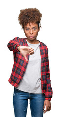 Beautiful young african american woman wearing glasses over isolated background looking unhappy and angry showing rejection and negative with thumbs down gesture. Bad expression.