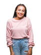 © Krakenimages.com - Young braided hair african american girl wearing sweater over isolated background with a happy and cool smile on face. Lucky person.
