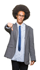 Young african american business man with afro hair wearing glasses looking unhappy and angry showing rejection and negative with thumbs down gesture. Bad expression.