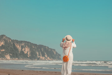 woman on the beach in summer