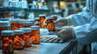 © tong2530 - The pharmacist's hands work carefully with pill bottles and medical tools.