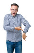 © Krakenimages.com - Handsome middle age elegant senior man wearing glasses over isolated background In hurry pointing to watch time, impatience, upset and angry for deadline delay