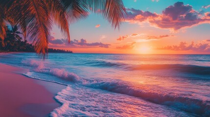 Wall Mural - Stunning tropical beach at sunset with vibrant hues in the sky, palm trees, and waves crashing gently, ideal for travel and summer vibes