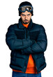© Krakenimages.com - Young hispanic man with beard wearing snow wear and sky glasses skeptic and nervous, disapproving expression on face with crossed arms. negative person.