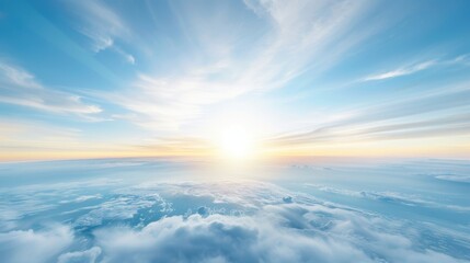 Wall Mural - the sky is blue with a few clouds and the sun is shining brightly