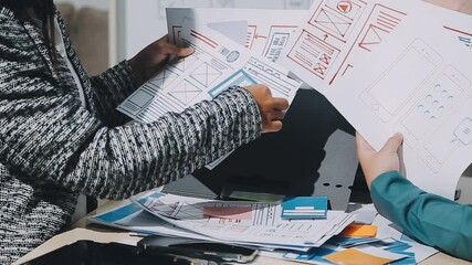 The designer team is designing the uxui system to make the uxui system work well on new phones and support system updates. Website development concept UI UX front end designer