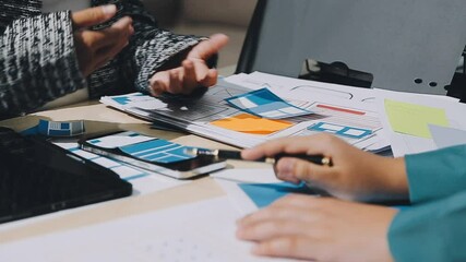 The designer team is designing the uxui system to make the uxui system work well on new phones and support system updates. Website development concept UI UX front end designer