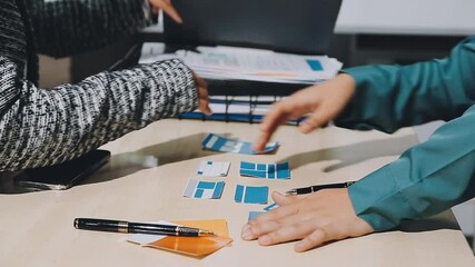The designer team is designing the uxui system to make the uxui system work well on new phones and support system updates. Website development concept UI UX front end designer