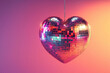 © Magryt - Heart shaped disco ball. Valentine's Day, love symbol and romantic exclusive relationships concept. Party decorations and dancing in nightclub theme. Heart-shaped discoball hanging from the ceiling
