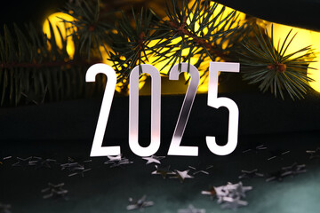 Wall Mural - new year's holiday background with bokeh with the number of the year 2025.