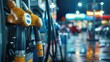 © George Louris  🜲 - Close-up of a gas pump nozzle at a gas station at night.
