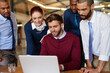 © ThurstanJam/peopleimages.com - Business people, teamwork and laptop for brainstorming, cooperation and internet with planning. Group, employees and coworkers with computer, connection and ideas with online reading and website info