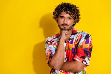 Sticker - Portrait of nice young man think empty space wear shirt isolated on yellow color background