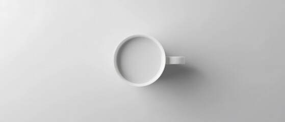 A top-down 3D view of a pristine white ceramic coffee cup on a simple, isolated background. 