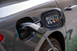 © hasan - EV car charging Point, Electric car charging station for charge EV battery, Plug for vehicle with electric engine