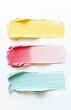 © Art_You - Pastel paint swatches in soft yellow, red, and mint green on a white background, showcasing vibrant and colorful artistic creativity