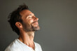 © MagnusCort - a close up of a smiling man's face