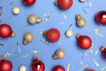 Wall Mural - Flat lay composition with Christmas balls on blue background