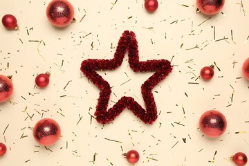 Wall Mural - Flat lay composition with Christmas balls, confetti and decorative star on beige background