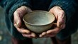 © Felix - Hands Holding Empty Bowl