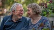 © Sviatlana - A man and a woman are sitting on a bench and smiling at each other