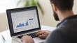 © Felix - Analyzing Data on Laptop
