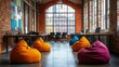 © Arti - Startup office space, open area with bean bags and desks, bright colors, natural daylight