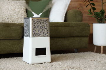 Wall Mural - Modern air humidifier on floor in stylish living room