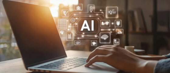 People typing on laptop with AI icon hovering above