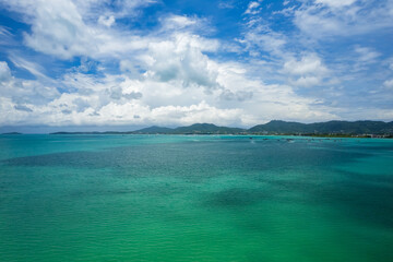 Blue sky white clouds over sea