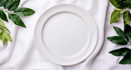 Poster - elegant white plate on table with green leaves