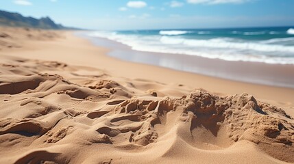 Wall Mural - Close up sand with blurred sea sky background, summer day  