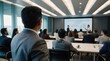 © VistaVisions - Confident businessman giving a presentation in front of crowd in meeting conference seminar room. Leadership authority teamwork in business concept