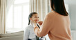 © PeakPoints/peopleimages.com - School, dressing and mom with child in home getting ready for education, learning and classes. Family, morning routine and happy mother with girl prepare with tie, uniform and clothes for academy