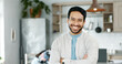© PeakPoints/peopleimages.com - Home, kitchen and portrait of man with smile, confidence and freelancer with support for family wellness. Morning, relax and proud dad in house with arms crossed, remote work and happy face in India
