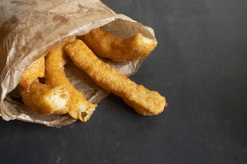 Close up of porra,similar to churros, is a classic Spanish breakfast consumed with hot chocolate or coffee with milk