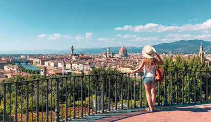 Wall Mural - Woman tourist traveling in Italy, Florence cityscape