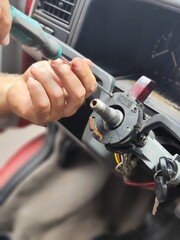 Vehicle Maintenance in Progress: Technician Using Tools for Auto Repair and Service