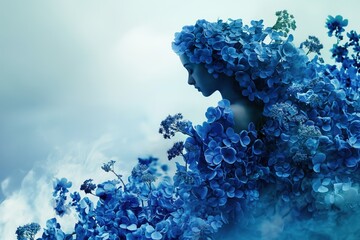 Stunning woman full-body shape made of blue flowers against natural background with perfume concept. Center composition artistic photo in 3 2 aspect ratio.