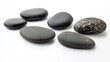 © Phatharaporn - Smooth Gray Stones On White Background.
