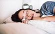 © Frank Coop/peopleimages.com - Woman, tired and sleeping in bed for nap, relax and exhausted with peace, comfort and weekend rest in house. Female person, fatigue and asleep in bedroom for break, morning and burnout with pillow