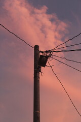 power pole with sunset background