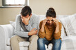 © Chanelle2000/peopleimages.com - Unhappy couple, argument and frustrated with living room, angry and drama in disagreement as partner. Woman, man and annoyed with fight, depressed and differences in home or lounge as married people