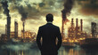 © alphaonetwo - A man in suit looking at oil platform