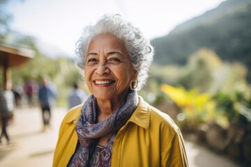 Wall Mural - Smiling portrait of a happy senior Mexican woman in nursing home