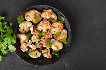 Vegetarian food. Fried cauliflower on plate