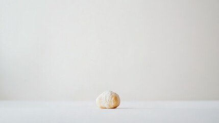 Wall Mural - Single Powdered Doughnut on White Surface