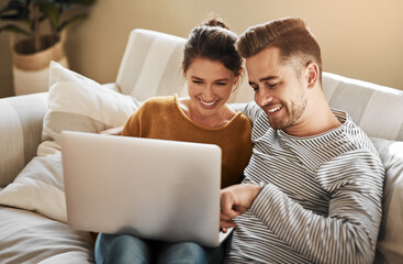 Couple, relax and laptop on sofa for website, streaming and family video call in home. Man, happy woman and computer in living room for connectivity, love and tech for communication or choosing media