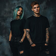 © ImagineThatStudios - A mockup of a man and a woman in a black T-shirt in gothic look