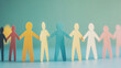 © CozyDigital - Diversity of people. Team of different people. Paper figures of people holding hands, different colors.